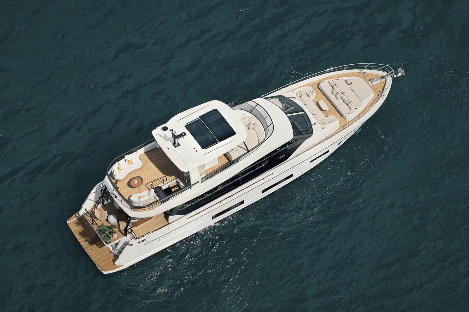 The yacht seen from directly above, teak decks and bathing platform