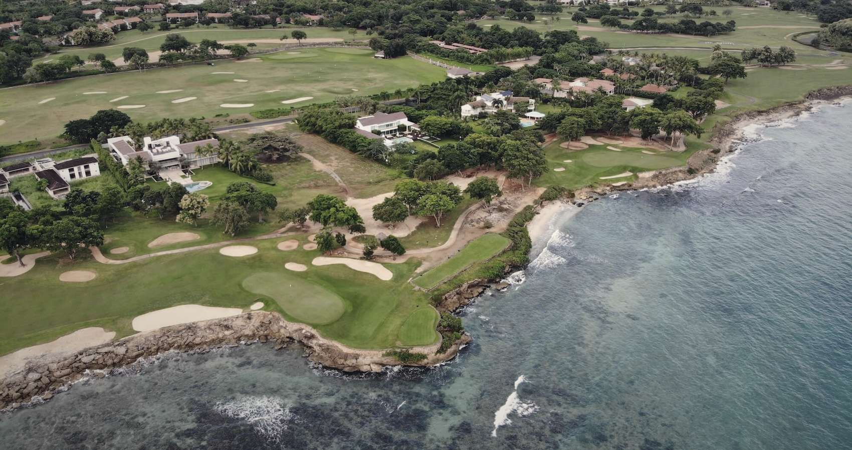 The coastline at Casa de Campo, greens running down to the sea