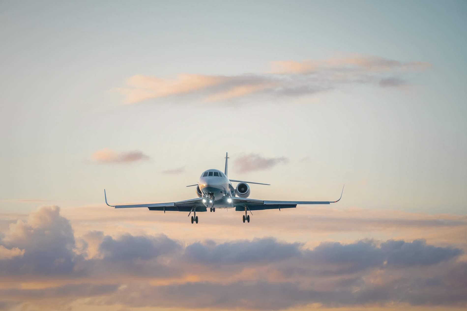 A business jet on the ramp at last light