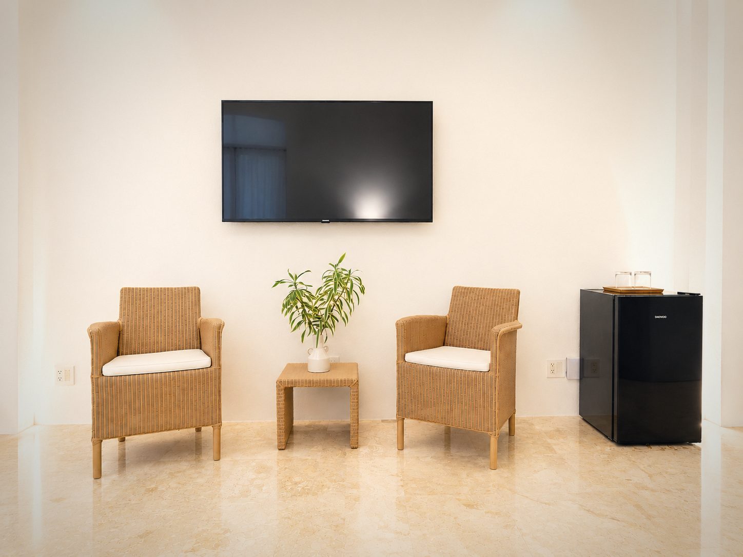 Chairs and a refrigerator in the guest rooms, Villa Aurelia, Casa de Campo